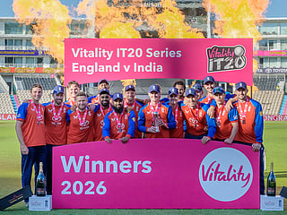 Man of the Series England's Harry Brook holds the trophy as England players celebrate their Series win after the fifth Twenty20 (T20) International match against India at Utilita Bowl in Southampton on July 11, 2026.