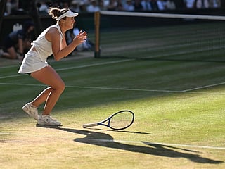 Czech Republic's Linda Noskova celebrates winning against Czech Republic's Karolina Muchova during their women's singles final tennis match on the thirteenth day of the 2026 Wimbledon Championships at The All England Lawn Tennis and Croquet Club in Wimbledon, southwest London, on July 11, 2026.