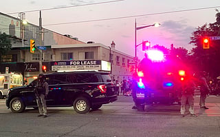 Emergency Task Force vehicles and police officers are seen on the site of a shooting in Toronto, Canada on July 11, 2026.