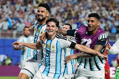Argentina's Julian Alvarez (9) celebrates after scoring his side's second goal during the World Cup quarterfinal soccer match against Switzerland in Kansas City, Mo., Saturday, July 11, 2026. 