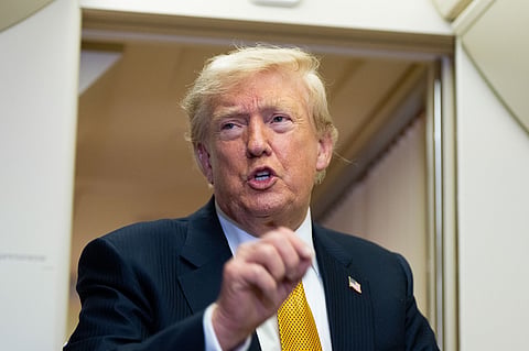 President Donald Trump speaks with reporters in flight on Air Force One after landing at U.S. Air Force Base at RAF Mildenhall, in Suffolk, Eastern England, Wednesday, July 8, 2026.
