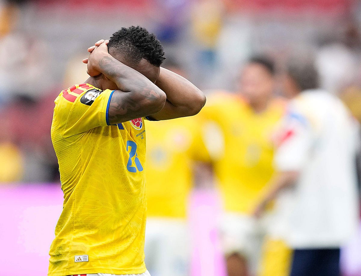 Colombia's Jaminton Campaz reacts after losing to Switzerland during a penalty shootout in the World Cup round of 16 soccer match between Switzerland and Colombia in Vancouver, British Columbia.