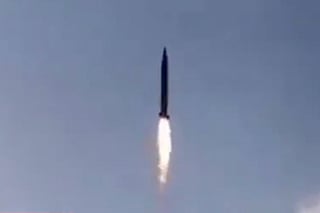 A screengrab taken from an Iran state media video showing IRGC firing a missile. 