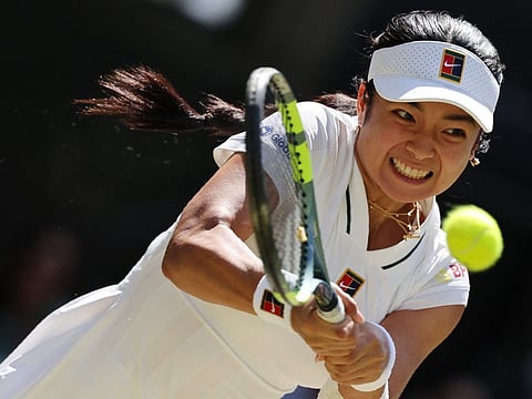 Philippines' Alex Eala returns to Italy's Jasmine Paolini during their women's singles round of 16 match of the 2026 Wimbledon Championships at The All England Lawn Tennis and Croquet Club in Wimbledon, southwest London, on July 6, 2026.