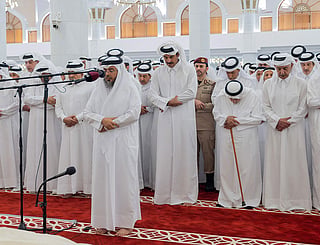 Qatar's Emir Sheikh Tamim bin Hamad Al Thani (C) attending the funeral of his father, former leader Sheikh Hamad bin Khalifa Al Thani, at the Imam Mohammed ibn Abd Al Wahhab Mosque in Doha.