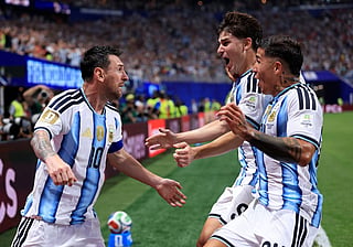 Lionel Messi #10 of Argentina celebrates after scoring the team's second goal with teammates Julian Alvarez #9 and Enzo Fernandez #24 of Argentina during the FIFA World Cup 2026 Round Of 16 match between Argentina and Egypt at Atlanta Stadium on July 07, 2026 in Atlanta, Georgia.