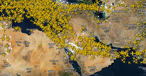 An AirNav Radar screenshot shows commercial flight activity from July 14 across the Gulf region, where many airlines have adjusted routes or avoided certain airspace following the latest European aviation safety advisory amid heightened US-Iran tensions.