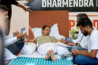 Environmentalist Sonam Wangchuk being attended by medical professionals on the 18th day of his indefinite hunger strike during a protest by the Cockroach Janata Party (CJP), demanding the resignation of Union Education Minister Dharmendra Pradhan.