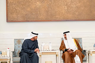 Sheikh Mohamed bin Zayed Al Nahyan offers condolences to Sheikh Tamim bin Hamad Al Thani Emir of Qatar (R), on the death of Sheikh Hamad bin Khalifa Al Thani, at Lusail Palace.