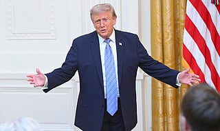 US President Donald Trump gestures after delivering an address to the nation from the East Room of the White House in Washington, DC on July 16, 2026.