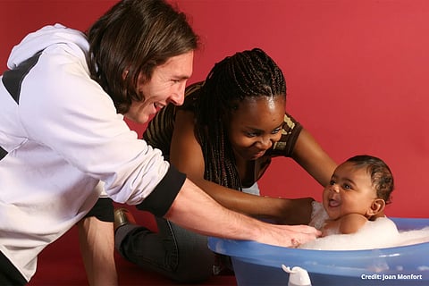Messi bathing baby Lamine Yamal