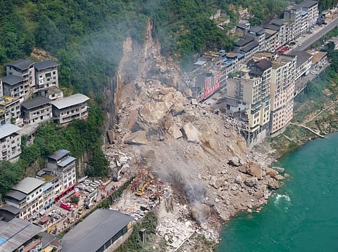 Rescue workers search for survivors at the site of a landslide in Pengshui County in Chongqing, China on July 17, 2026.