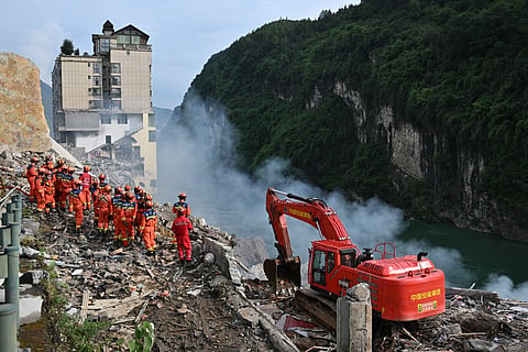 Rescue workers search for survivors at the site of a landslide in Pengshui County in Chongqing, China on July 17, 2026.