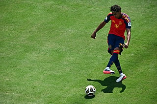 Spain's forward #19 Lamine Yamal shoots but fails to score during the 2026 World Cup football tournament final match between Spain and Argentina at the New York/New Jersey Stadium in East Rutherford on July 19, 2026.