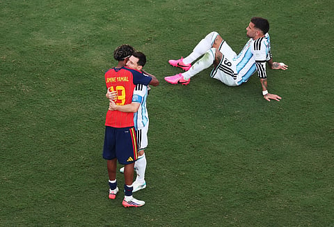 Lamine Yamal #19 of Spain is congratulated by Lionel Messi #10 of Argentina after the 1-0 win during the FIFA World Cup 2026 Final match between Spain and Argentina at New York New Jersey Stadium on July 19, 2026 in East Rutherford, New Jersey.