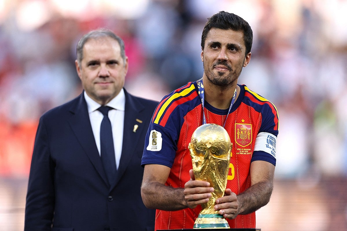 Rodri #16 of Spain kisses the FIFA World Cup Winner's Trophy as he receives the medal following the FIFA World Cup 2026 Final match between Spain and Argentina at New York New Jersey Stadium on July 19, 2026 in East Rutherford, New Jersey.