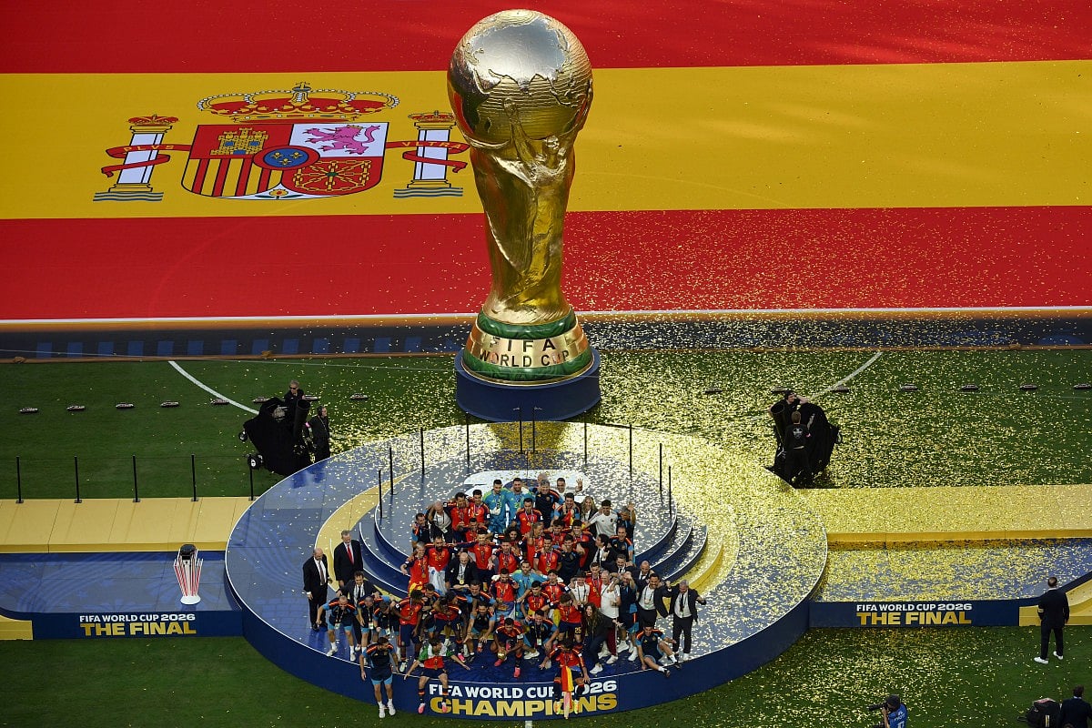 Spain's players celebrate with the trophy during the final ceremony after the 2026 World Cup football tournament final match between Spain and Argentina at the New York/New Jersey Stadium in East Rutherford on July 19, 2026.