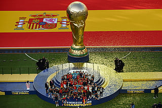 Spain's players celebrate with the trophy during the final ceremony after the 2026 World Cup football tournament final match between Spain and Argentina at the New York/New Jersey Stadium in East Rutherford on July 19, 2026.