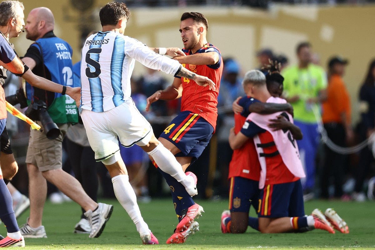 Argentina's midfielder #05 Leandro Paredes (L) clashes with Spain's defender #04 Eric Garcia at the end of the 2026 World Cup football tournament final match between Spain and Argentina at the New York/New Jersey Stadium in East Rutherford on July 19, 2026.