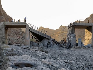 A heavily-damaged bridge which was hit by a US strike is pictured along the road connecting Roudan and Bandar Abbas in southern Iran.