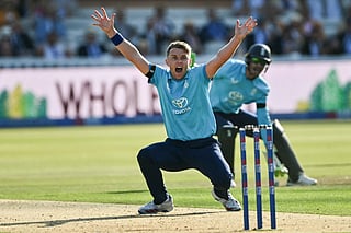 England's Sam Curran (L) appeals unsuccessfully for the wicket of India's Rohit Sharma (not pictured) during the third one-day international (ODI) cricket match between England and India at Lord's cricket ground in London on July 19, 2026.