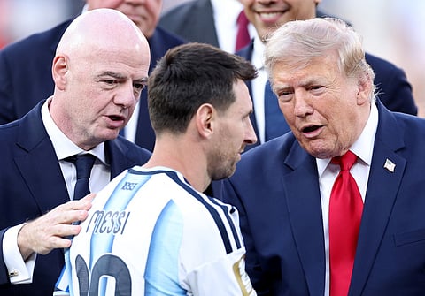 Lionel Messi #10 of Argentina receives his runner-up medal from FIFA President Gianni Infantino and U.S. President Donald Trump after the FIFA World Cup 2026 Final match between Spain and Argentina at New York New Jersey Stadium on July 19, 2026 in East Rutherford, New Jersey.