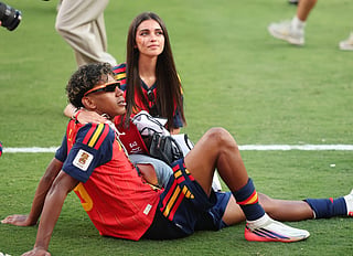 Lamine Yamal #19 of Spain celebrates with his girlfriend Ines Garcia after the team's victory following the FIFA World Cup 2026 Final match between Spain and Argentina at New York New Jersey Stadium on July 19, 2026 in East Rutherford, New Jersey.