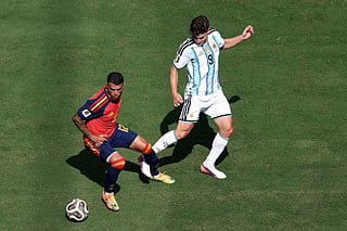 Pedro Porro #12 of Spain controls the ball against Julian Alvarez #9 of Argentina during the FIFA World Cup 2026 Final match between Spain and Argentina at New York New Jersey Stadium on July 19, 2026 in East Rutherford, New Jersey.