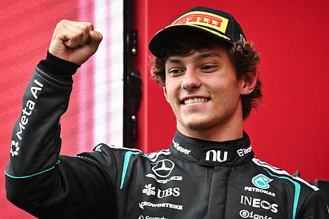 First-placed Mercedes' Italian driver Kimi Antonelli celebrates as he arrives on stage for the podium ceremony after competing in the Formula One Belgian Grand Prix at the Spa-Francorchamps circuit, in Spa, on July 19, 2026.