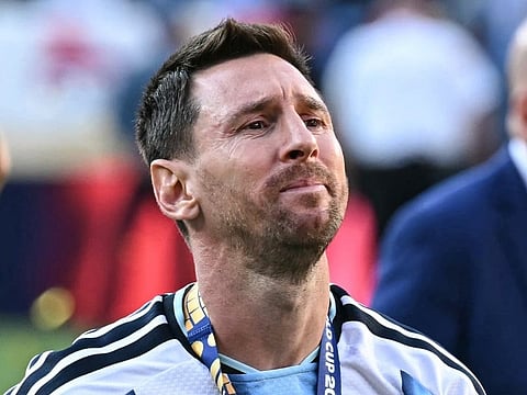 Argentina forward Lionel Messi (#10) reacts after Spain's victory in the 2026 FIFA World Cup final, with fans chanting his name despite Argentina's defeat, at New York New Jersey Stadium in East Rutherford on July 19, 2026.