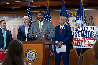 Rep. Byron Donalds, R-Florida, centre, flanked by Rep. Chip Roy, R-Texas, left, and Rep. Ralph Norman, R-South Carolina, right, speaks to reporters as the conservative House Freedom Caucus slams the Senate for not acting on the Save America Act at the Capitol in Washington, Thursday, June 25, 2026.