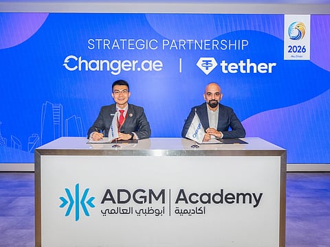 Changer. AE and Tether sign MOU to explore cross-border USD₮ settlement solution and advance the UAE's digital finance ecosystem