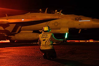 Night flight ops on the aircraft carrier USS George HW Bush in the Arabian Sea on day 12 of consecutive US military strikes on Iran targets. 