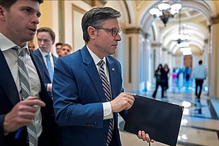 Speaker of the House Mike Johnson, R-Louisiana, leaves the chamber as members debate a series of measures including a continuing resolution to fund the government and a spending package for the Iran war, at the Capitol in Washington, Tuesday, July 21, 2026.