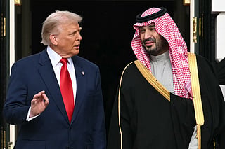US President Donald Trump with Crown Prince and Prime Minister of  Saudi Arabia Mohammed bin Salman on the South Lawn at the White House in Washington, DC on November 18, 2025.