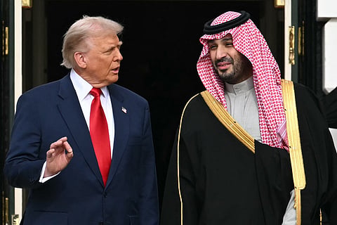 US President Donald Trump with Crown Prince and Prime Minister of  Saudi Arabia Mohammed bin Salman on the South Lawn at the White House in Washington, DC on November 18, 2025.