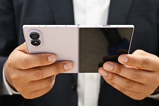 A customer tries out a newly-released Samsung Galaxy Z Fold8 smartphone at a Samsung store in Seoul on July 23, 2026.
