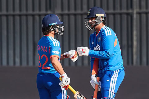 India's Vaibhav Sooryavanshi (R) bumps fists with Ishan Kishan (L) during the first match in the One Day International cricket series played between Zimbabwe and India at Harare Sports Club on July 23, 2026 in Harare.