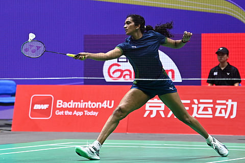 Pusarla V. Sindhu of India hits a return to Chen Yufei of China during their women's singles round 16 match at the China Open badminton tournament in Changzhou, eastern China's Jiangsu province on July 23, 2026.