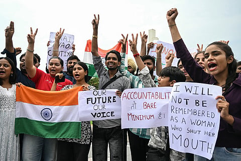 Students celebrate the resignation of India's Education Minister Dharmendra Pradhan, in Amritsar on July 25, 2026 amid an ongoing protest by the Cockroach Janta Party (CJP) at New Delhi's jantar Mantar over alleged NEET examination irregularities.