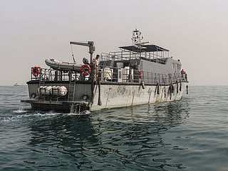 A vessel of the navy of Yemen's Aden-based internationally recognised government patrols a shipping lane off Hanish Island in the Red Sea on July 27, 2026. 