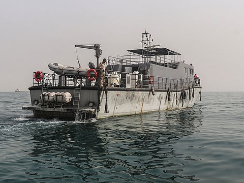 A vessel of the navy of Yemen's Aden-based internationally recognised government patrols a shipping lane off Hanish Island in the Red Sea on July 27, 2026. 