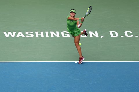 Alexandra Eala of the Philippines returns a shot during a women's singles match against Qinwen Zheng of China on day two of the Mubadala Citi DC Open 2026 at William H.G. FitzGerald Tennis Center on July 28, 2026 in Washington, DC. 