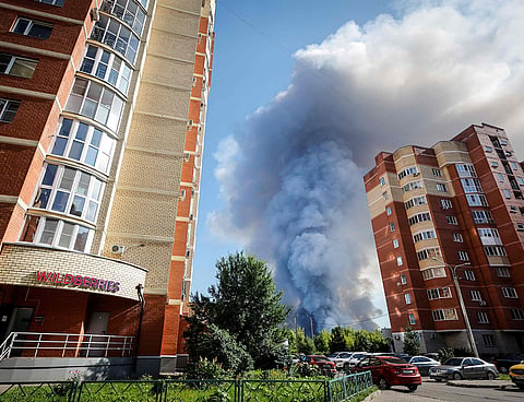 Smoke rising from a fire at the Russian e-commerce firm Wildberries' logistics complexes in the town of Elektrostal outside Moscow on July 18, 2026.