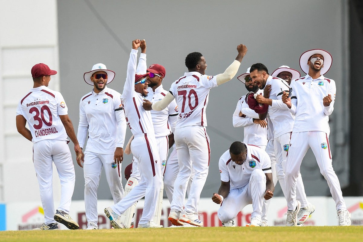West Indies players celebrate their 90-run victory over Pakistan on the fourth day of the first Test cricket match between West Indies and Pakistan at the Brian Lara Cricket Academy in Tarouba, Trinidad and Tobago, on July 28, 2026.