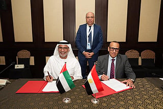 Saif Mohammed Al Suwaidi, Director General of the UAE General Civil Aviation Authority (GCAA) and Captain Sameh Fawzy, President of the Egyptian Civil Aviation Authority (ECAA) ink the pact.