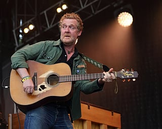 Glen Hansard performs at Lollapalooza in Chicago's Grant Park on Sunday, Aug. 3, 2014