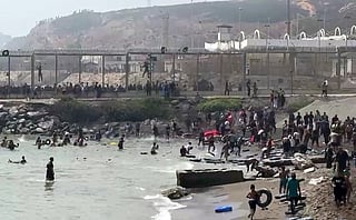 Watch: Migrants flood into Spain's Ceuta from Morocco
