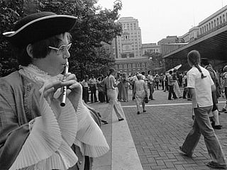 A young flute player in colonial costume plays ‘Yankee Doodle’ for crowds gathering to visit the Liberty Bell in Philadelphia, on July 3, 1976. 