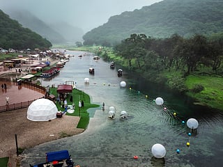 An aerial picture shows a touristic spot on the Wadi Darbat lake in the region of Dhofar, near Oman's Salalah city.